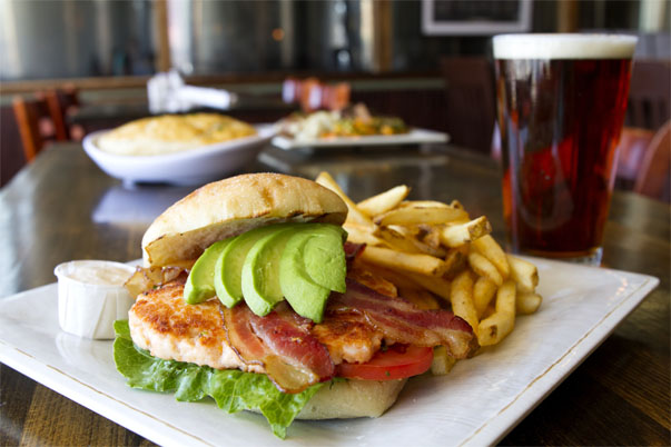 Balt Salmon Burger with fries and beer